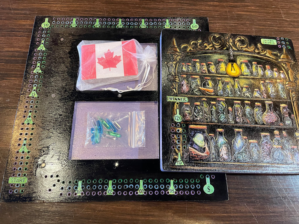 Cribbage Board game components including card and peg holder, and a detailed board with potion bottles.