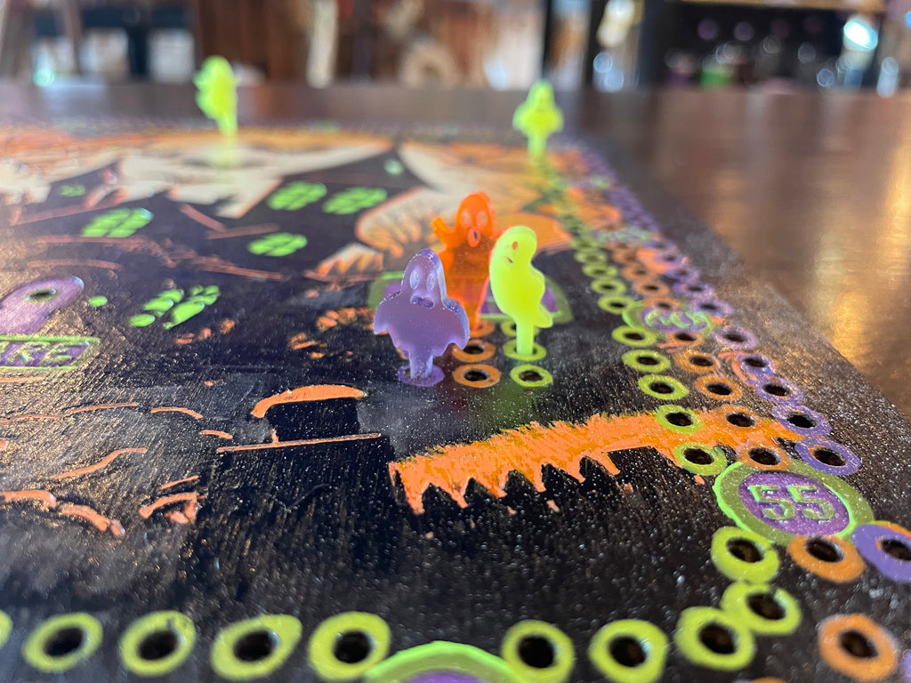 Board game with colorful pegs.