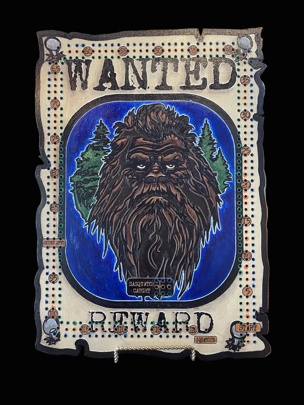 Decorative cribboard with a sasquatch illustration and 'Mandated Reward' text.