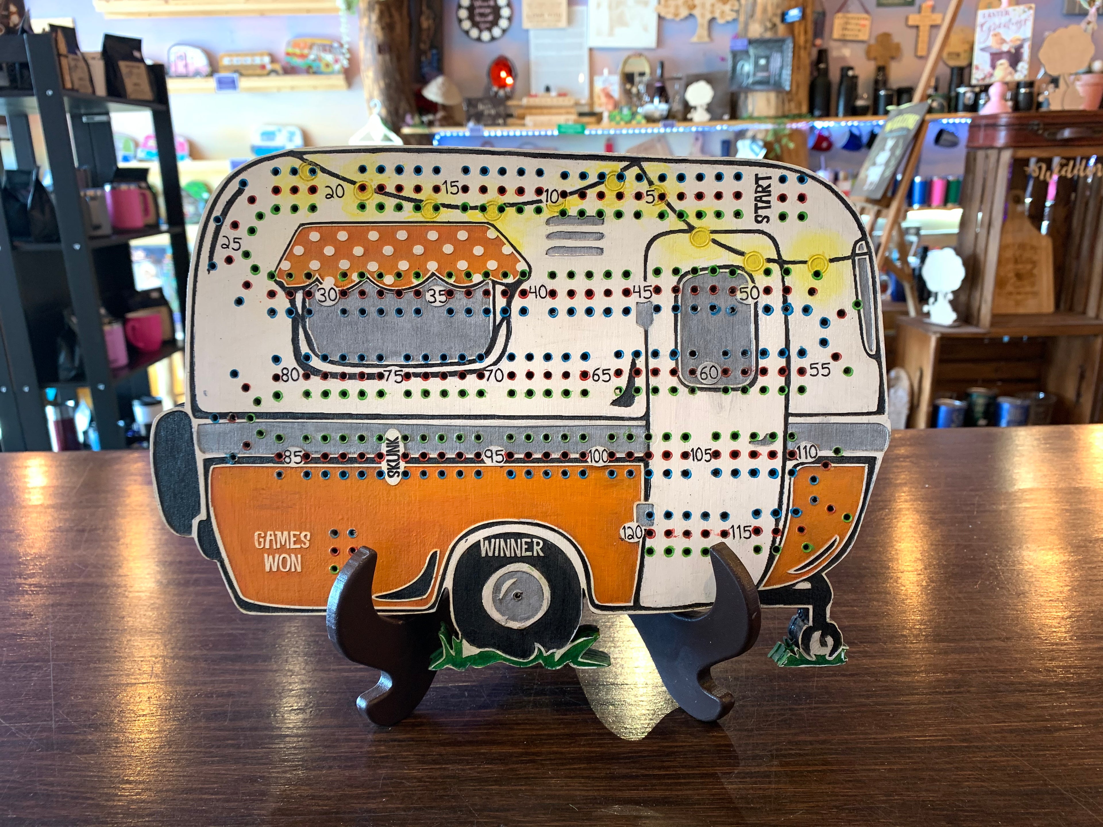 Crib board designed like a retro bowler camper.